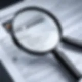 A magnifying glass inspecting documents